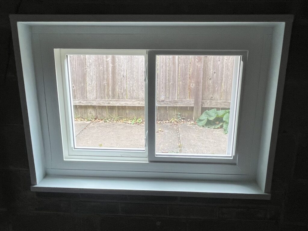 New basement sliding window